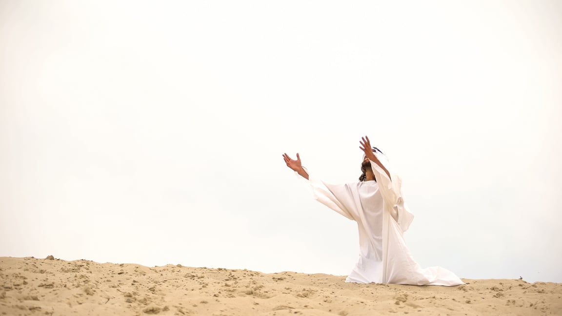 Muslim man in a white jellabah and scarf kneeling on a sand dune, raising hands in prayer to Allah. Islamic art
spiritual growth
creativity
faith
Allah
Quran verses
Hadith
muslim coloring book
meditation
peace